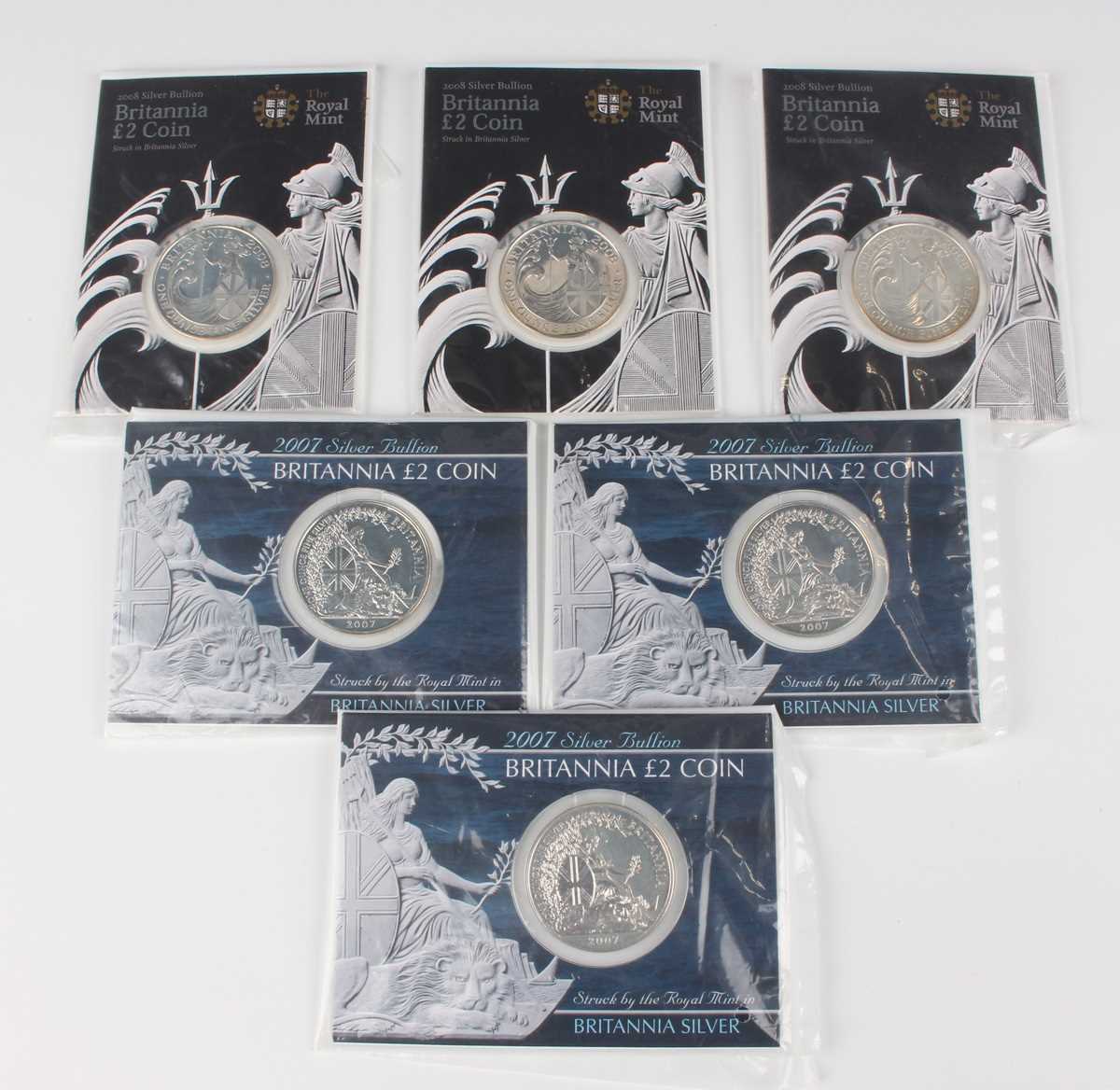 A group of six Royal Mint Silver Bullion Britannia two pounds coins, comprising three 2007 and three