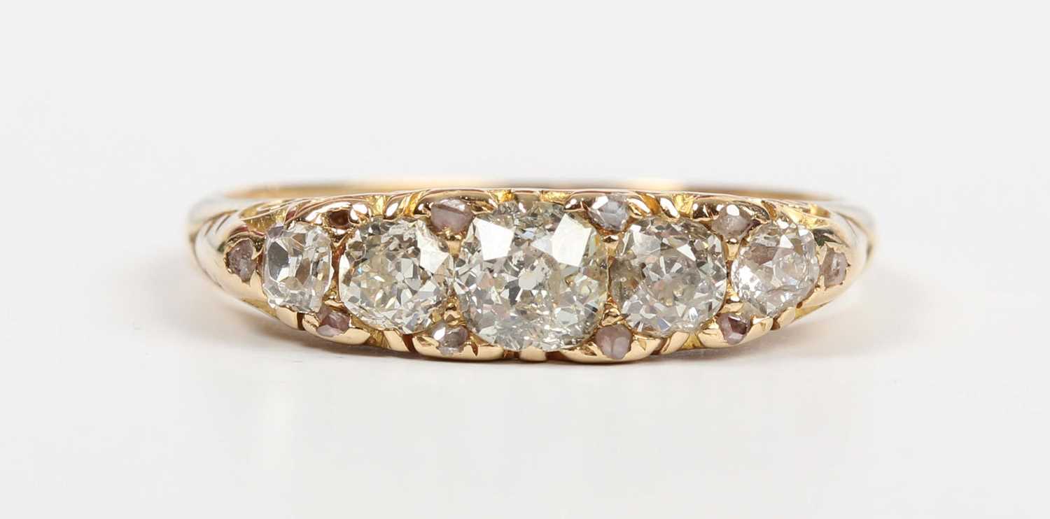 A gold and diamond five stone ring, mounted with a row of old cut diamonds graduating in size to the - Image 2 of 5