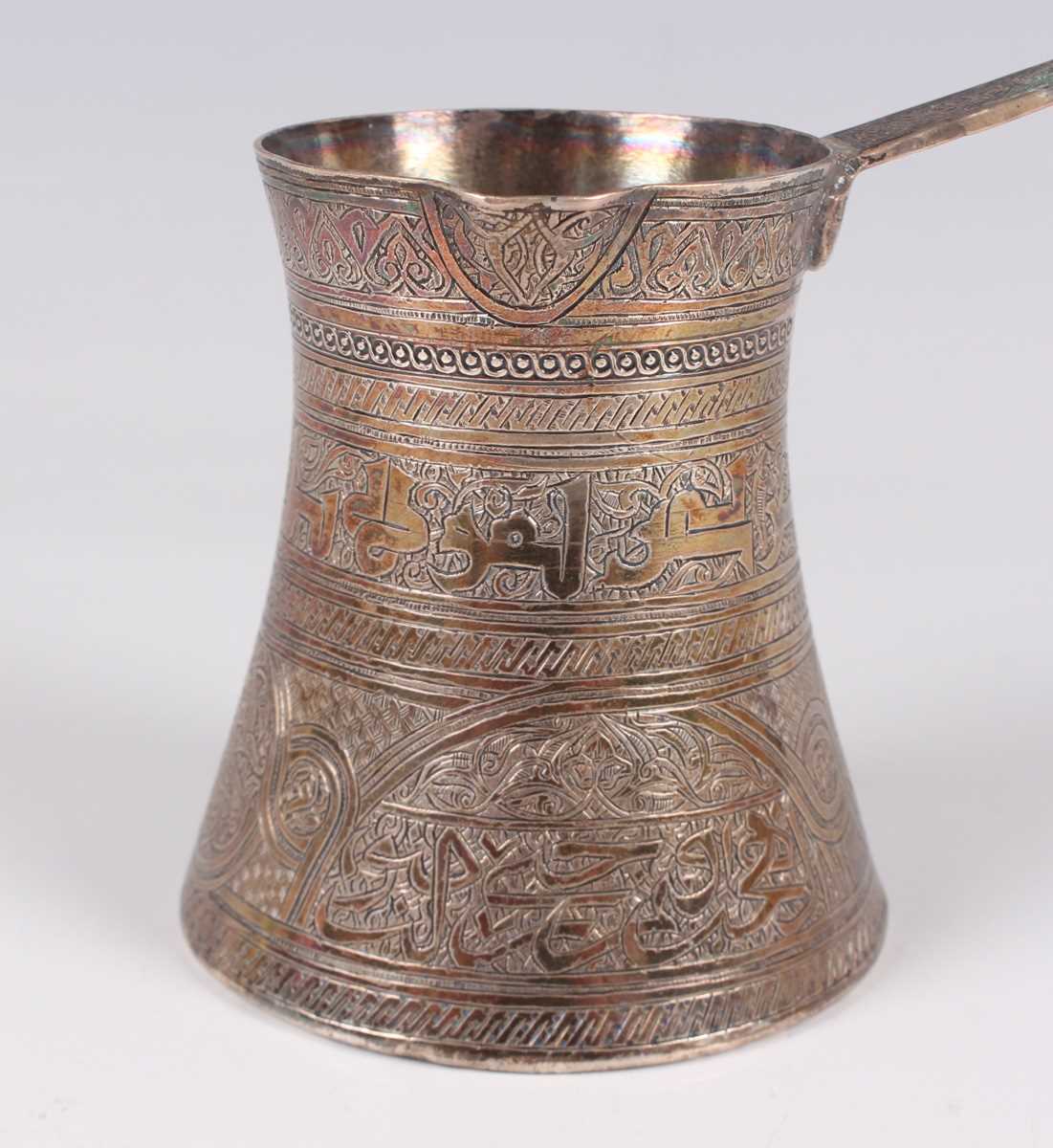 An Egyptian silver coffee pot of waisted cylindrical form with pouring lip and flat handle, all - Image 2 of 6