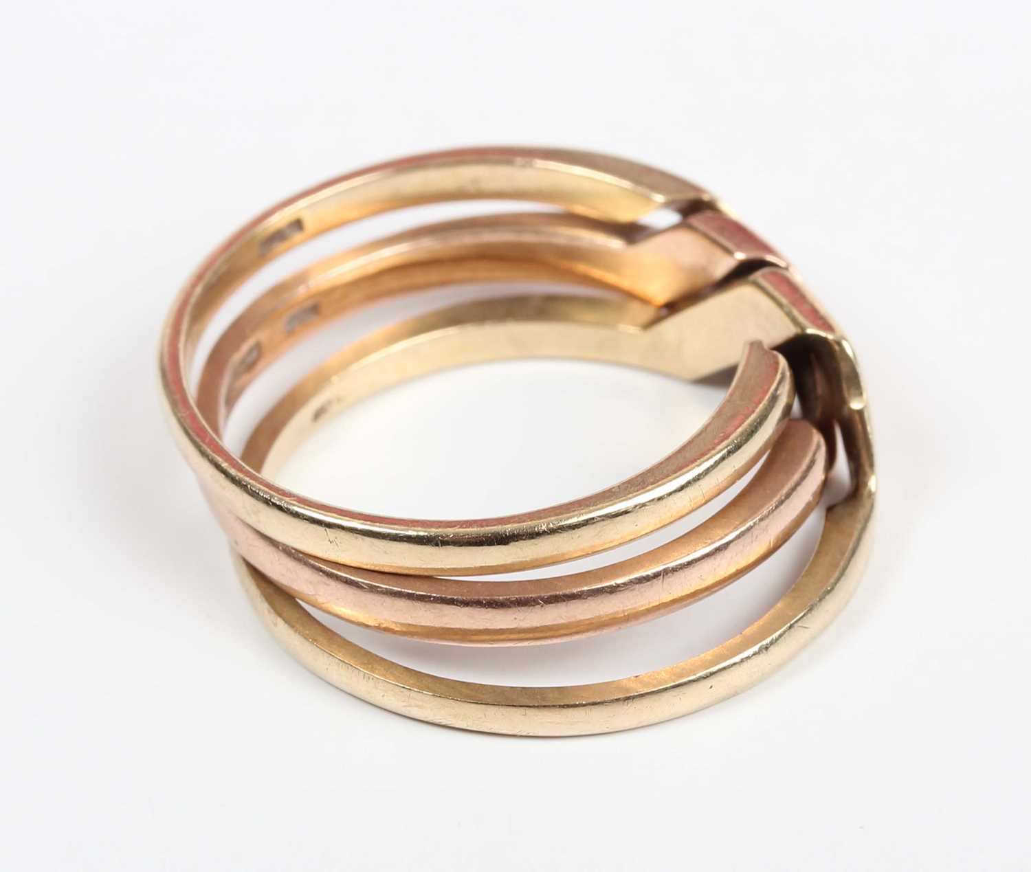 A 9ct three colour gold three section puzzle ring, weight 6.9g, ring size approx V1/2. - Image 4 of 5