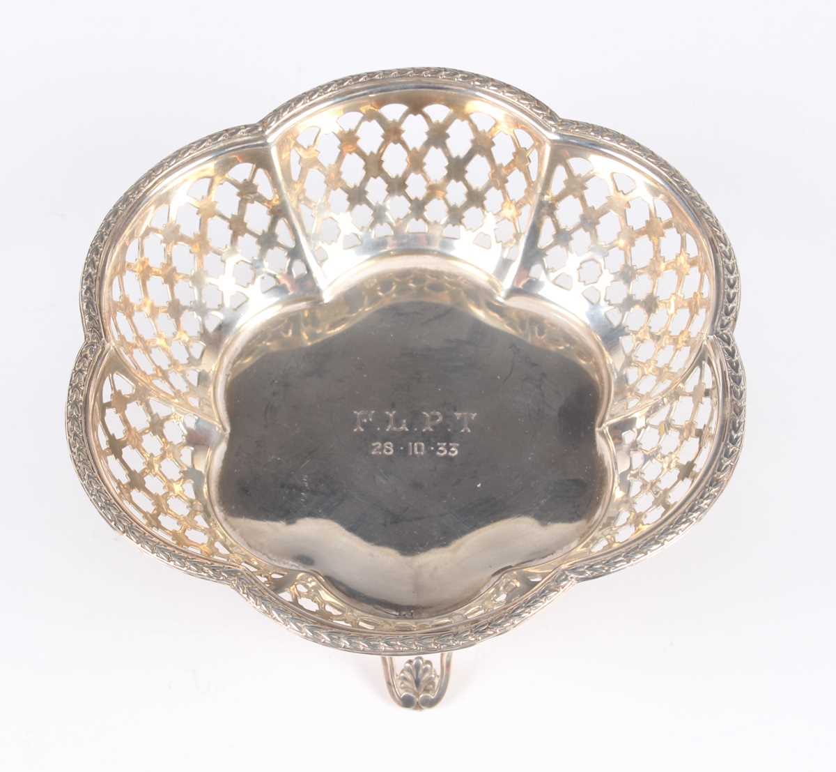 A pair of late Victorian silver circular lobed bonbon dishes, pierced and embossed with fruit - Image 9 of 11