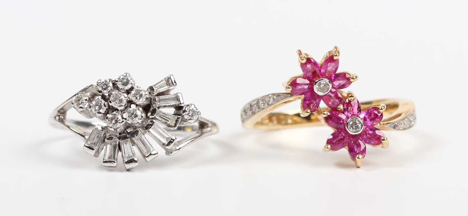 A gold, treated pink sapphire and diamond ring in a twin flowerhead shaped twist design, detailed ‘ - Image 2 of 4