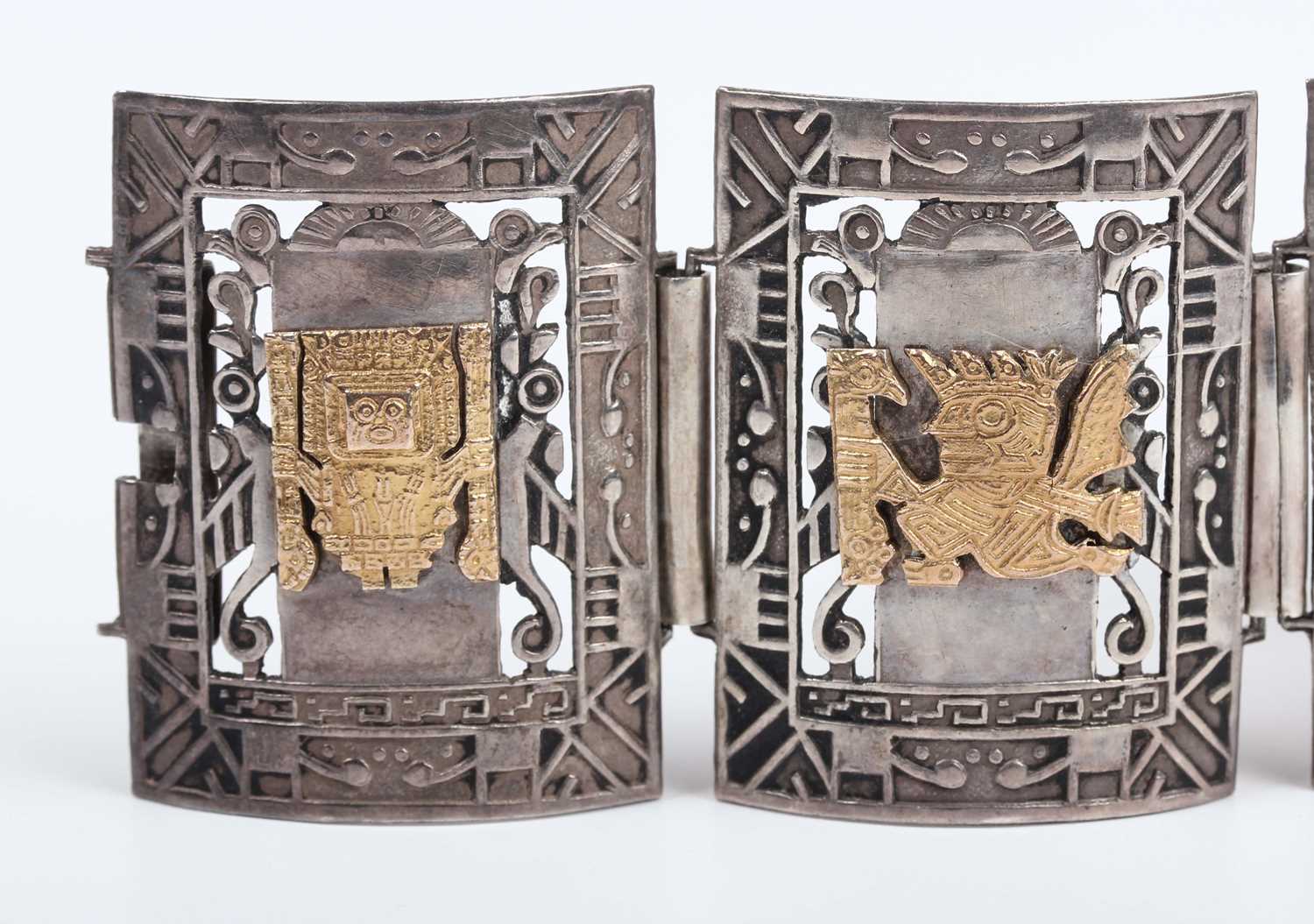 A Peruvian silver and gold panel link bracelet, each curved rectangular link decorated with a - Image 2 of 5