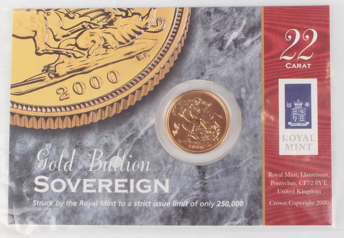 An Elizabeth II Gold Bullion sovereign 2000, mounted within a presentation card gift pack.