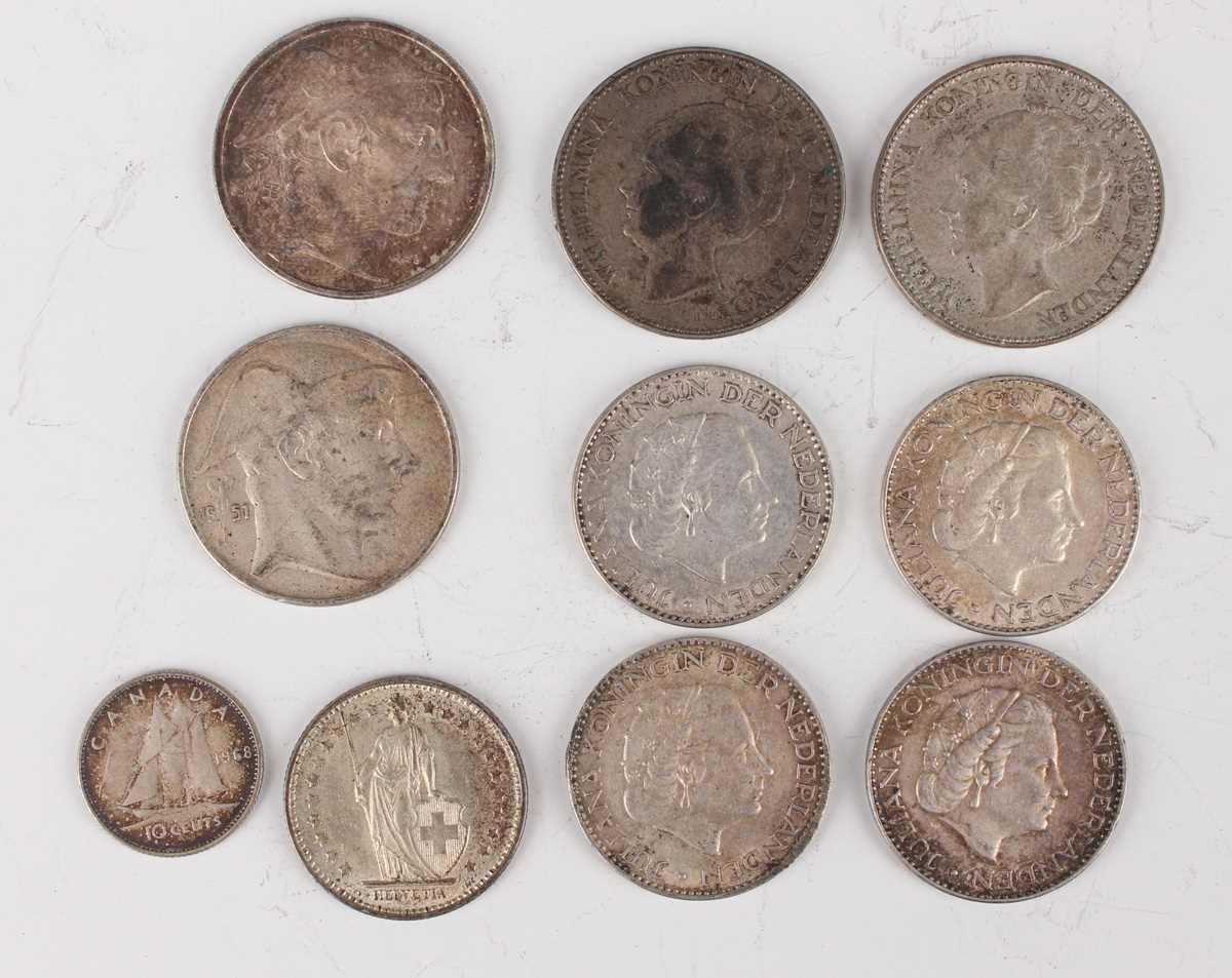 A small collection of various European and world silver and metal coinage, including a Switzerland - Image 4 of 5