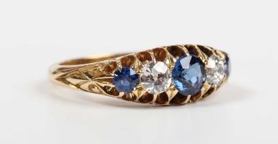 A gold, sapphire and diamond ring, mounted with three sapphires alternating with two old cut