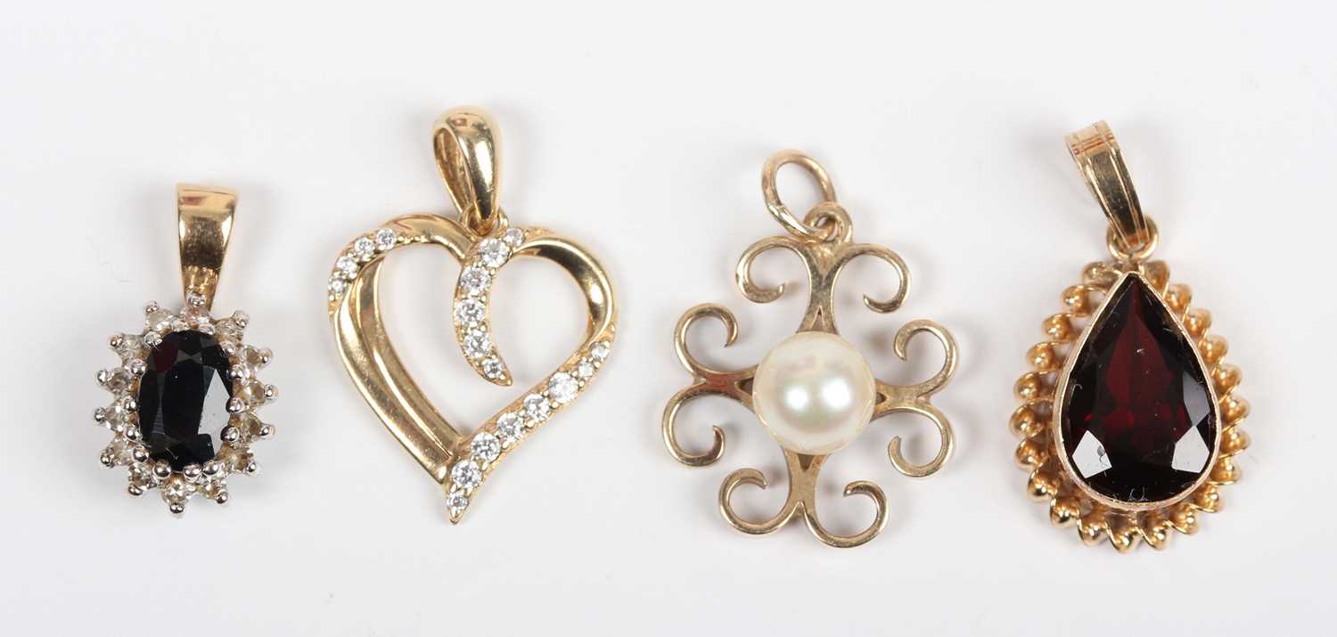 A gold and colourless gem set heart shaped pendant, detailed ‘9K’, length 1.9cm, a 9ct gold, - Image 2 of 2