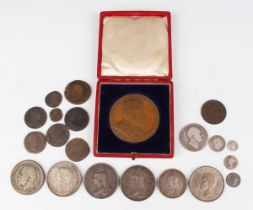 A small collection of coins, including a George V Wreath crown 1930, three other crowns, 1889,