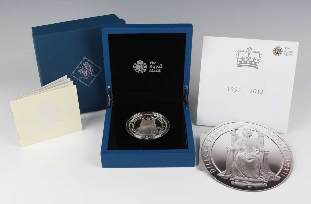 An Elizabeth II Royal Mint five-ounce silver coin celebrating HM The Queen's Diamond Jubilee 1952-