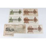 A group of three George V one pound notes, comprising two Chief Cashier N.K. Warren Fisher and one