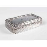 A George IV silver rectangular snuff box, the hinged lid with engine turned decoration within a