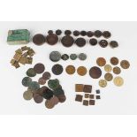 A small collection of paranumismatic items, comprising jettons, tokens and weights, including a