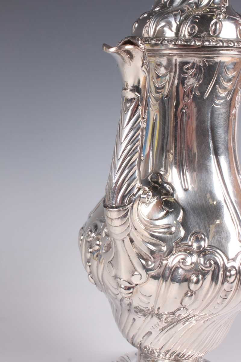 A George III silver baluster coffee pot with domed hinged lid and seed head finial above half-spiral - Image 3 of 4