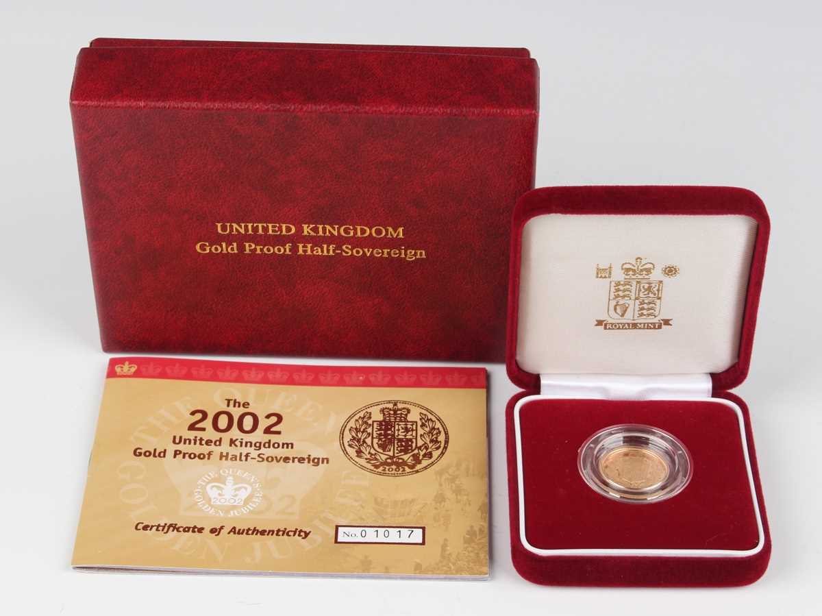 An Elizabeth II Royal Mint proof half-sovereign 2002, cased with certificate booklet, No. 01017.
