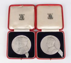 A Royal Mint George V and Mary Silver Jubilee medallion, diameter 5.5cm, within original gilt-tooled