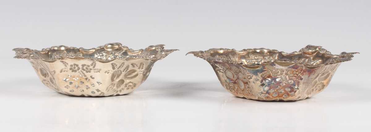A pair of late Victorian silver circular lobed bonbon dishes, pierced and embossed with fruit - Image 3 of 11