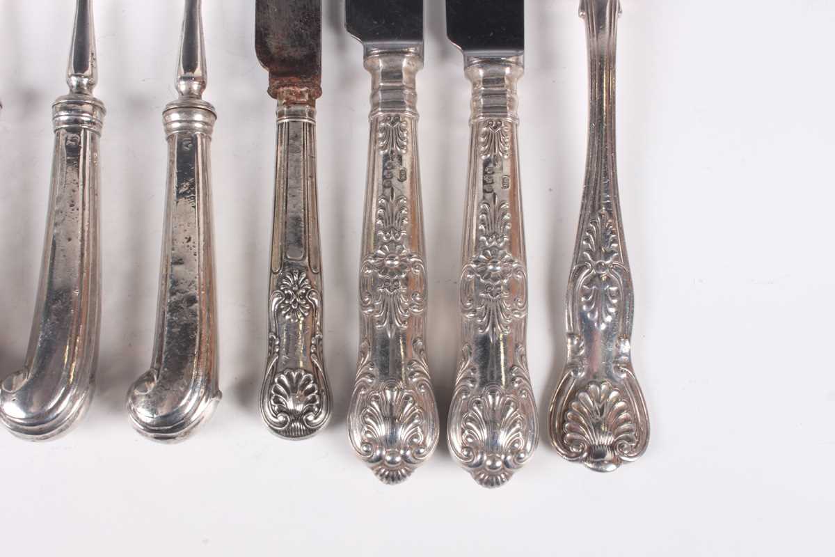 A set of six George V silver pistol handled two-pronged dinner forks, London 1928 by C.W. Fletcher & - Image 4 of 5