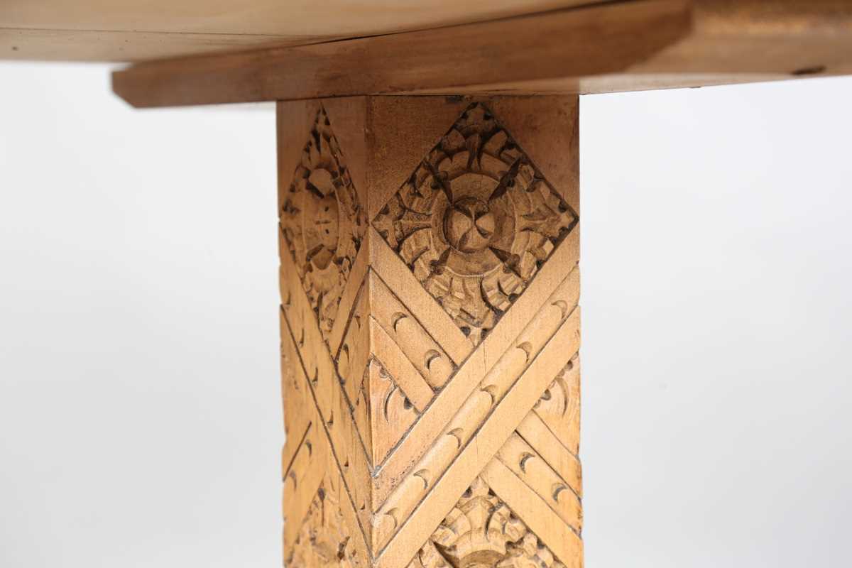 A 20th century Arts and Crafts style carved softwood centre table, the top decorated with wheat - Image 5 of 10