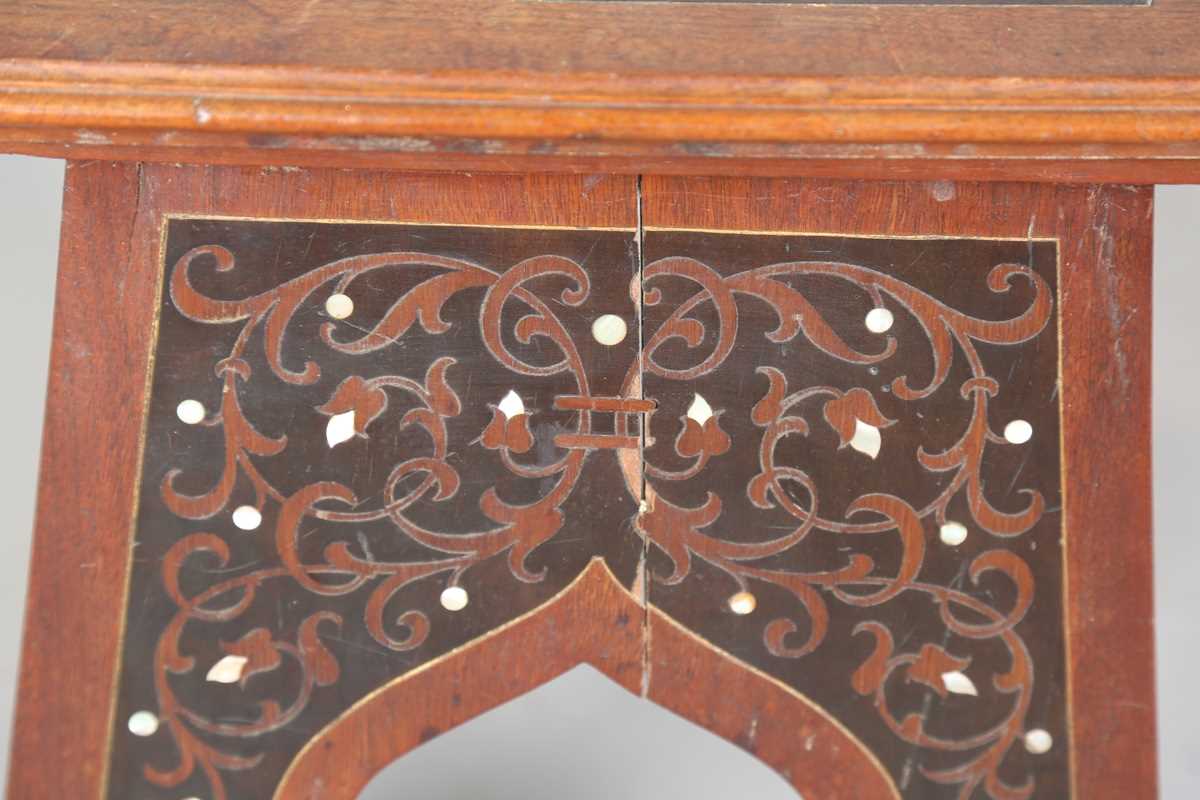 An early 20th century Continental Art Nouveau walnut square occasional table, the top and arched - Image 8 of 11