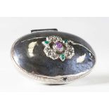 An early 20th century Arts and Crafts silver oval box by the Artificers' Guild, London 1911, the