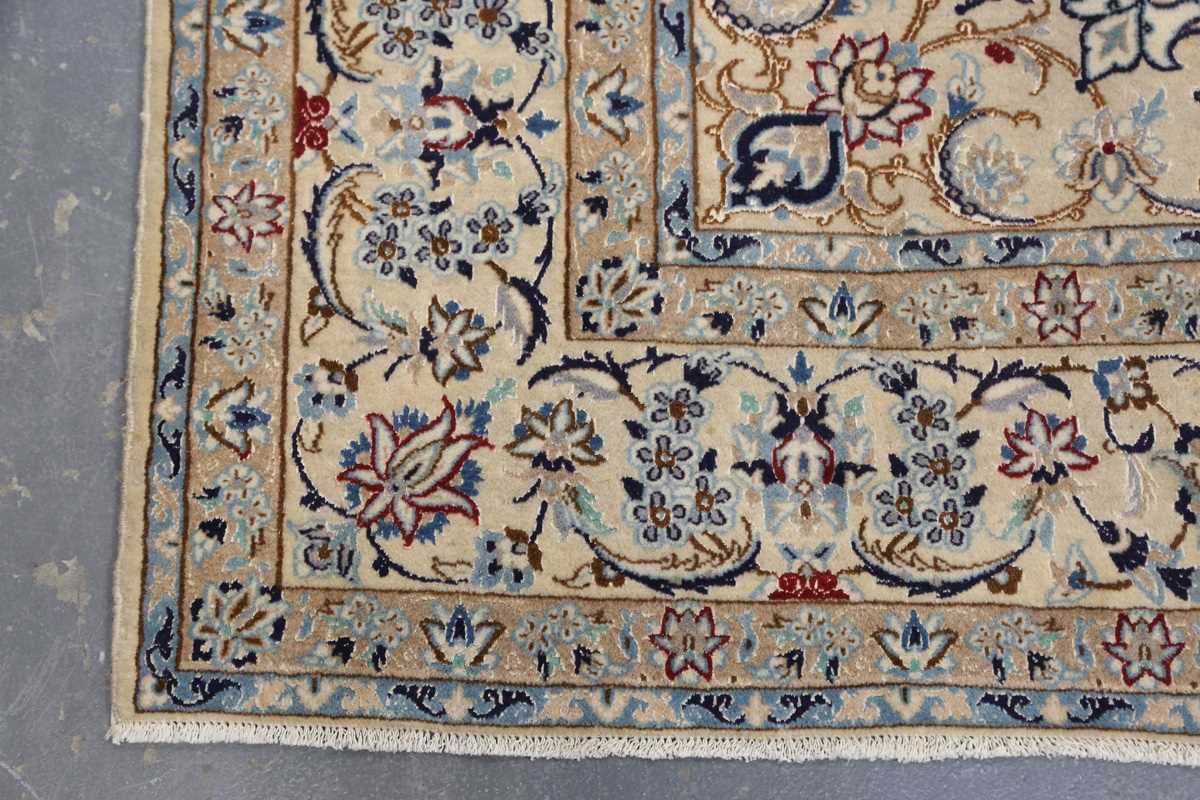 A Nain carpet, Central Persia, late 20th century, the cream field with a flowerhead medallion and - Image 6 of 8