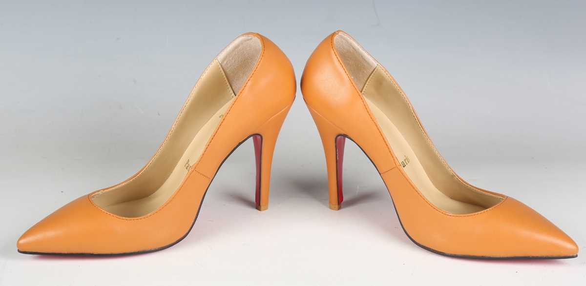 A pair of Christian Louboutin tan leather high-heeled lady's shoes, size 39.