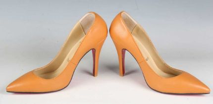 A pair of Christian Louboutin tan leather high-heeled lady's shoes, size 39.