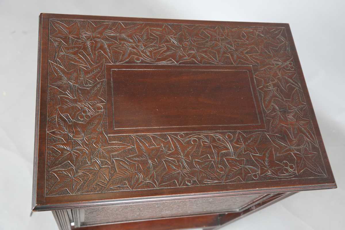 A late Victorian Aesthetic Movement mahogany tea table, fitted with a drop-leaf section to each - Image 2 of 9