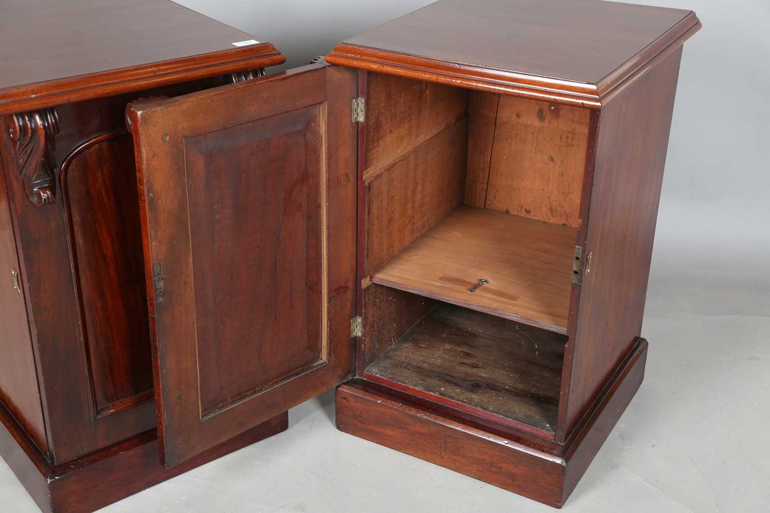 A pair of Victorian and later mahogany pedestal cabinets, each fitted with an arched panel door, - Image 7 of 10