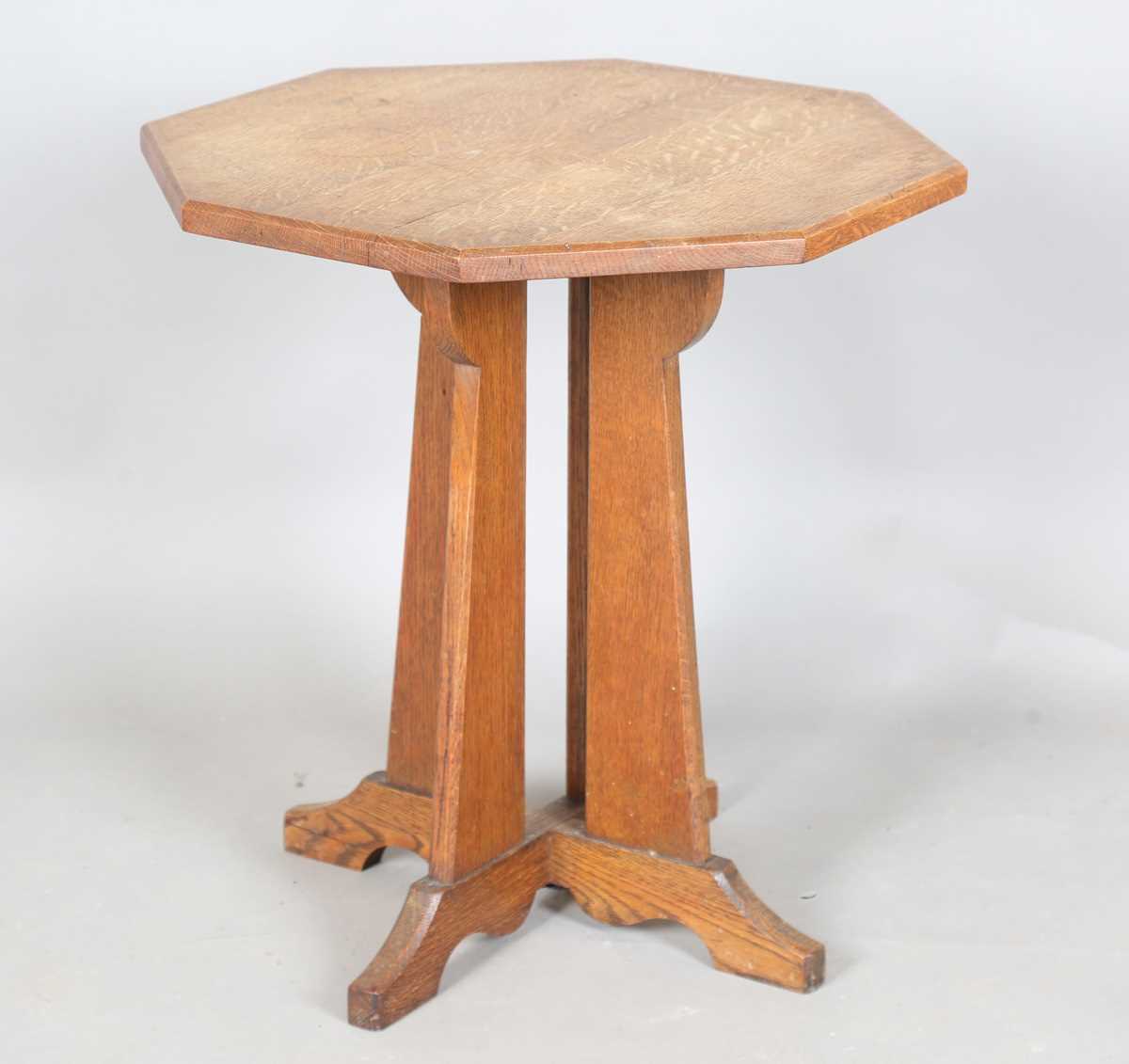 An early 20th century Arts and Crafts oak octagonal occasional table, attributed to Hypnos for