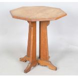 An early 20th century Arts and Crafts oak octagonal occasional table, attributed to Hypnos for
