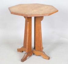 An early 20th century Arts and Crafts oak octagonal occasional table, attributed to Hypnos for