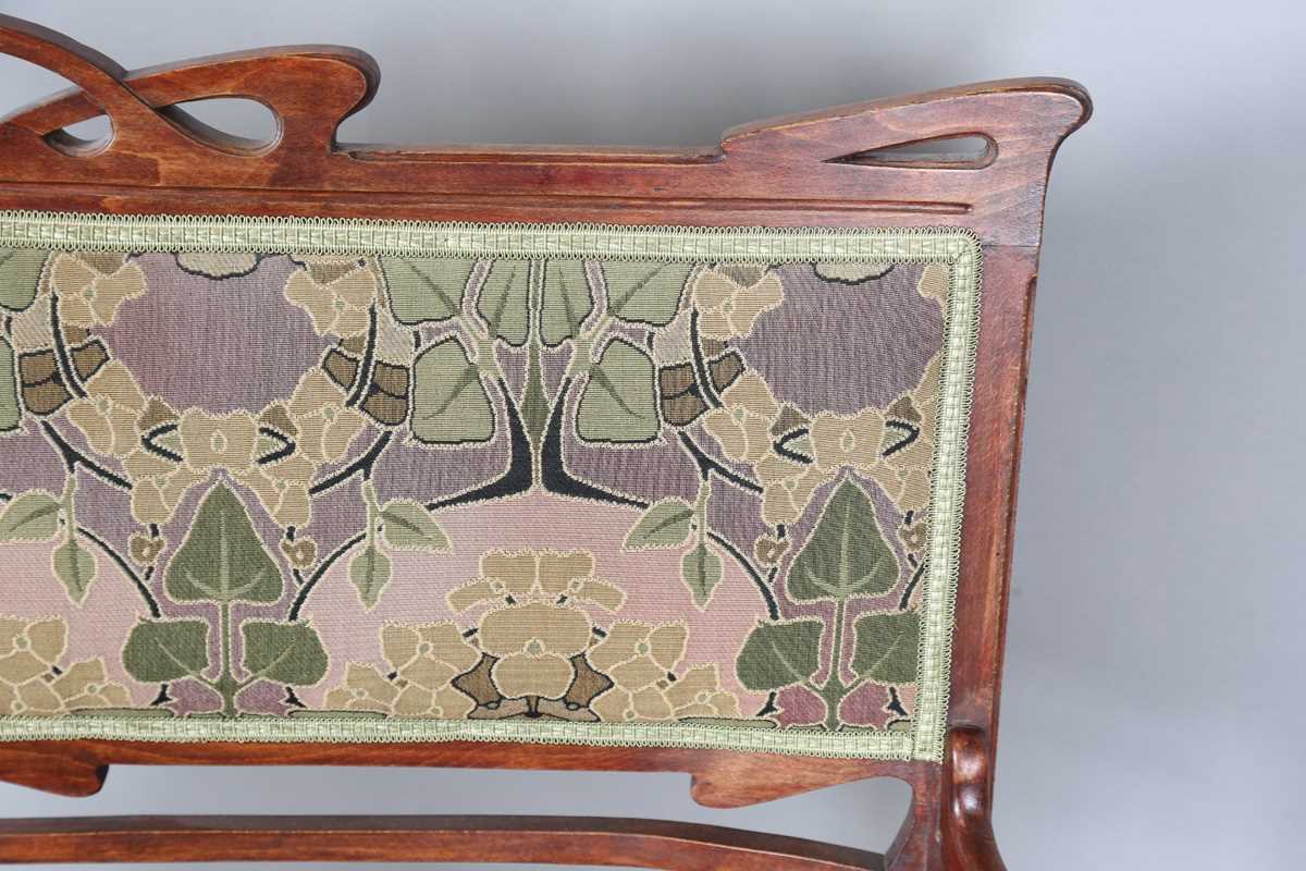 An Art Nouveau stained beech three-piece salon suite with pierced showframe and contemporary fabric, - Image 4 of 27