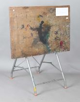 A mid-20th century adjustable drawing table, raised on a folding stand, width 108cm. Note: from