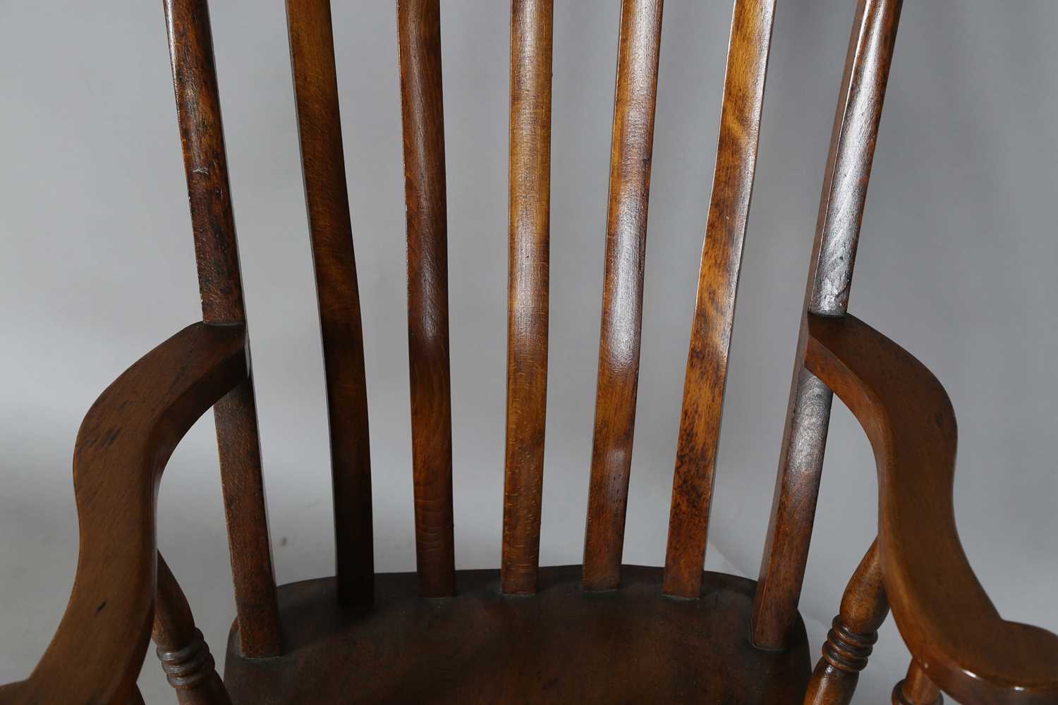 A late Victorian ash and elm comb back Windsor armchair, height 111cm, width 57cm, depth 69cm. - Image 3 of 9