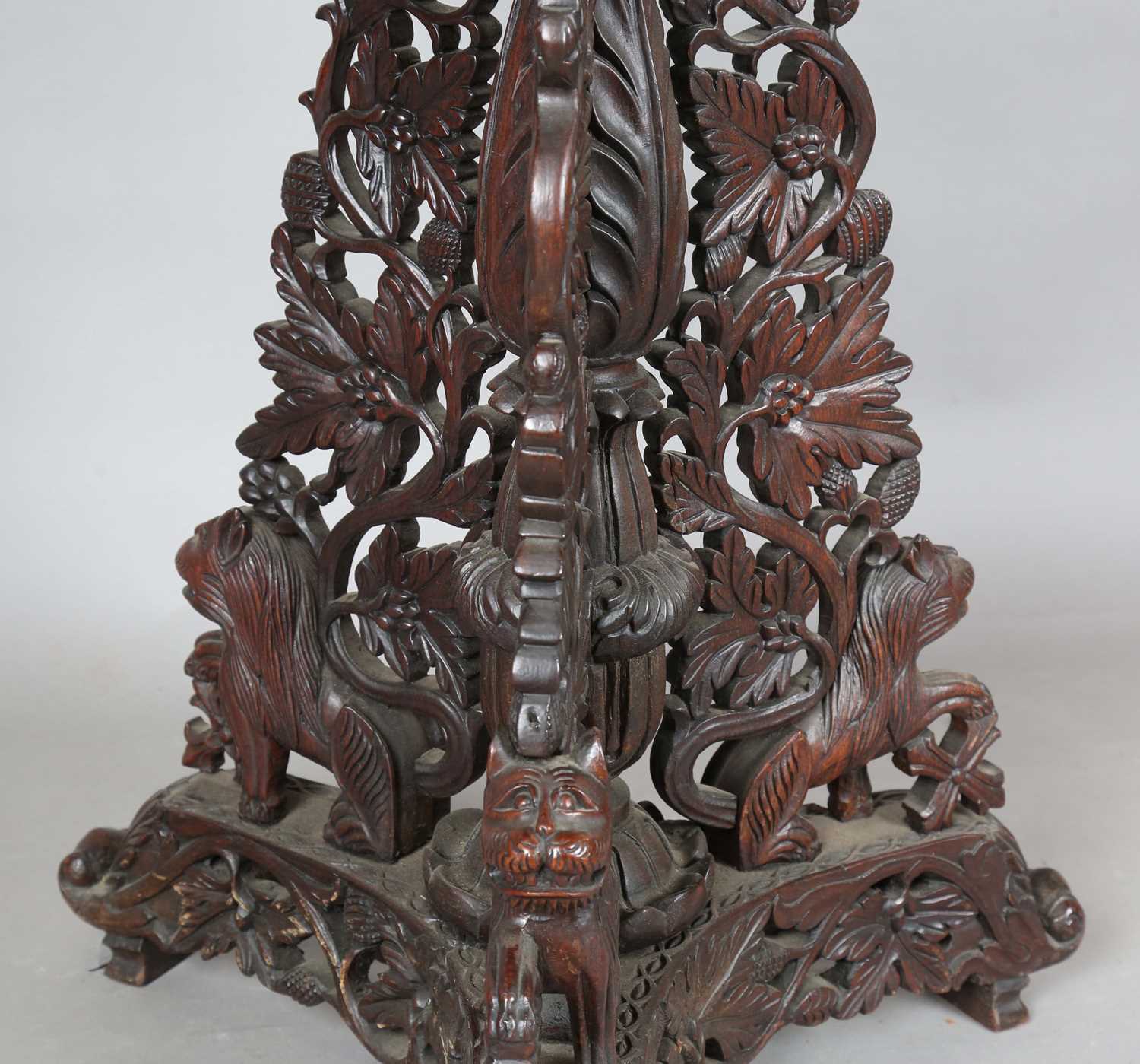A 19th century Burmese hardwood centre table, the shaped circular top above a tripod support of - Image 5 of 13