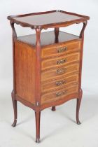 An Edwardian mahogany and satinwood crossbanded five-drawer music chest with a raised top and open