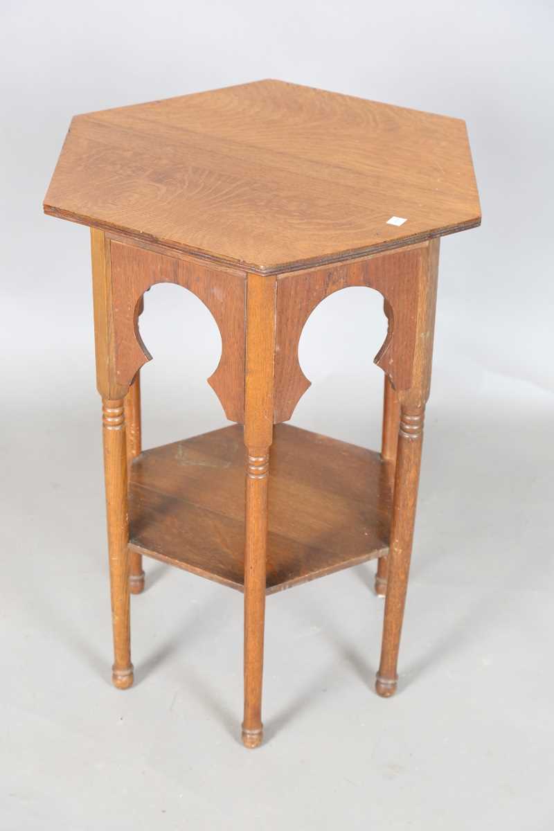 An Edwardian Arts and Crafts oak hexagonal occasional table, possibly by Liberty & Co, the Moorish - Image 7 of 8