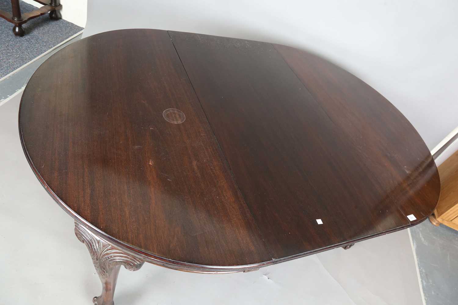 An early 20th century mahogany extending dining table, the circular top with single extra leaf, - Image 2 of 19