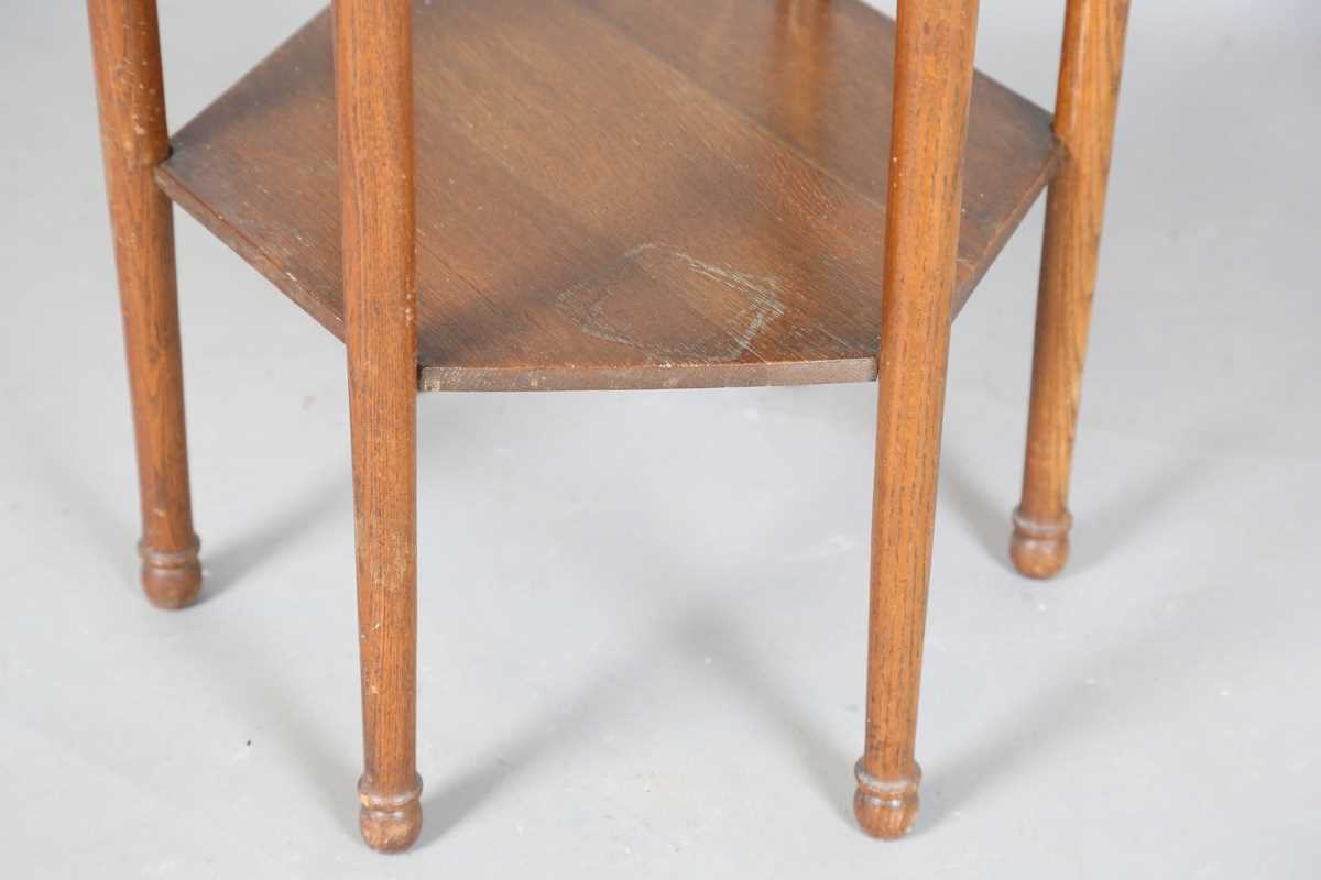 An Edwardian Arts and Crafts oak hexagonal occasional table, possibly by Liberty & Co, the Moorish - Image 4 of 8