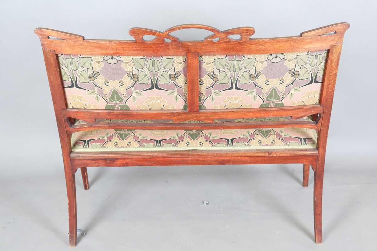 An Art Nouveau stained beech three-piece salon suite with pierced showframe and contemporary fabric, - Image 13 of 27