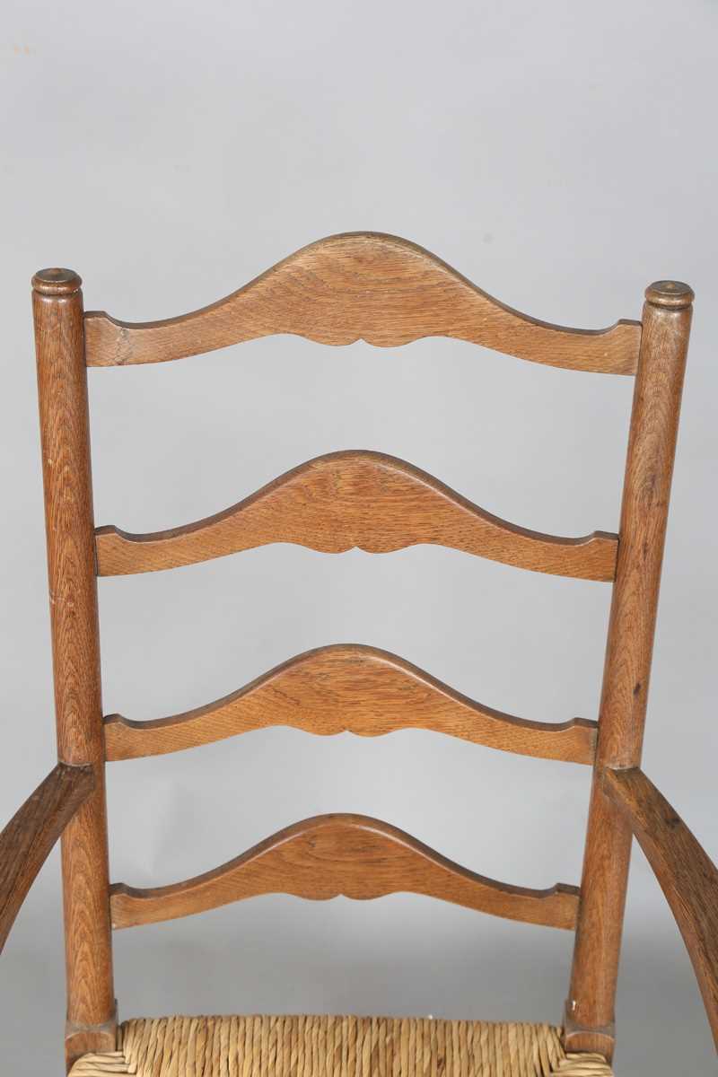 An Edwardian Arts and Crafts oak framed elbow chair, in the manner of William Birch, height 107cm, - Image 2 of 8