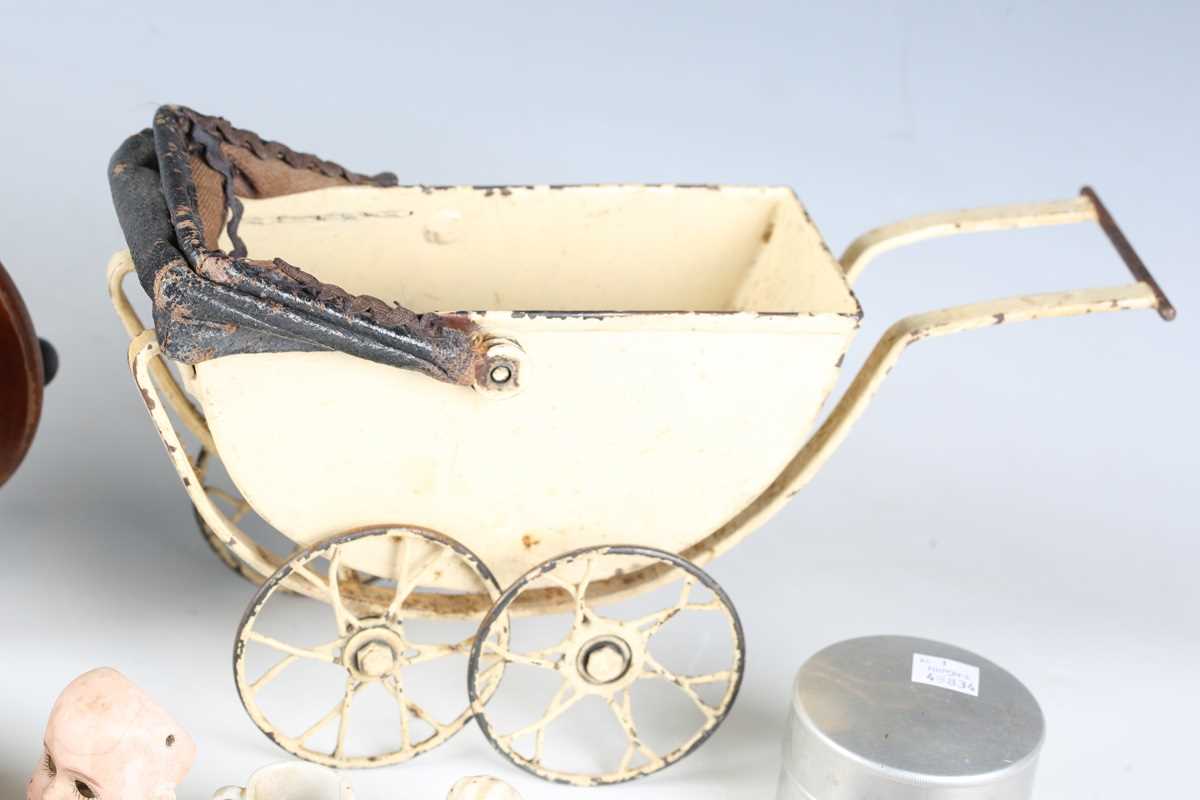 A mixed group of collectors' items, including an early 20th century metal doll's pram, length - Bild 2 aus 11