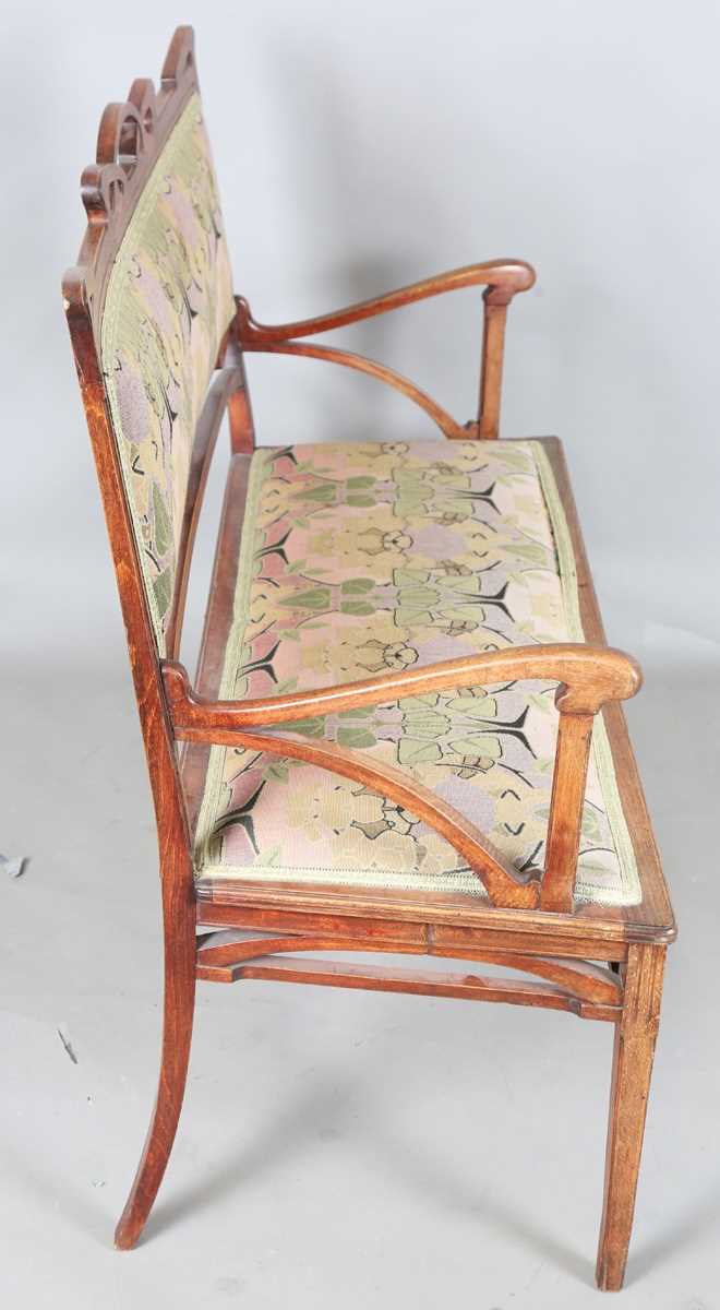 An Art Nouveau stained beech three-piece salon suite with pierced showframe and contemporary fabric, - Image 12 of 27