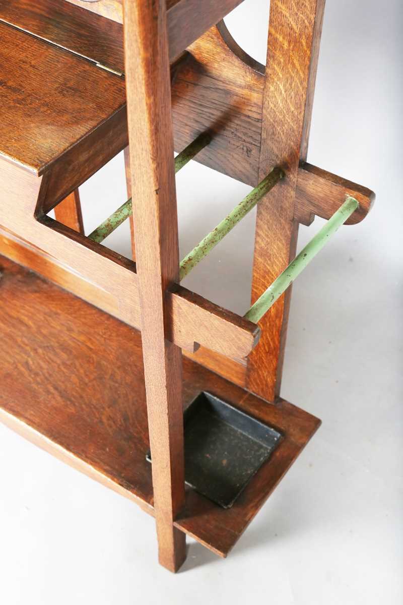 An Edwardian Arts and Crafts Glasgow School oak hallstand, the mirrored back inset with glazed - Image 12 of 13