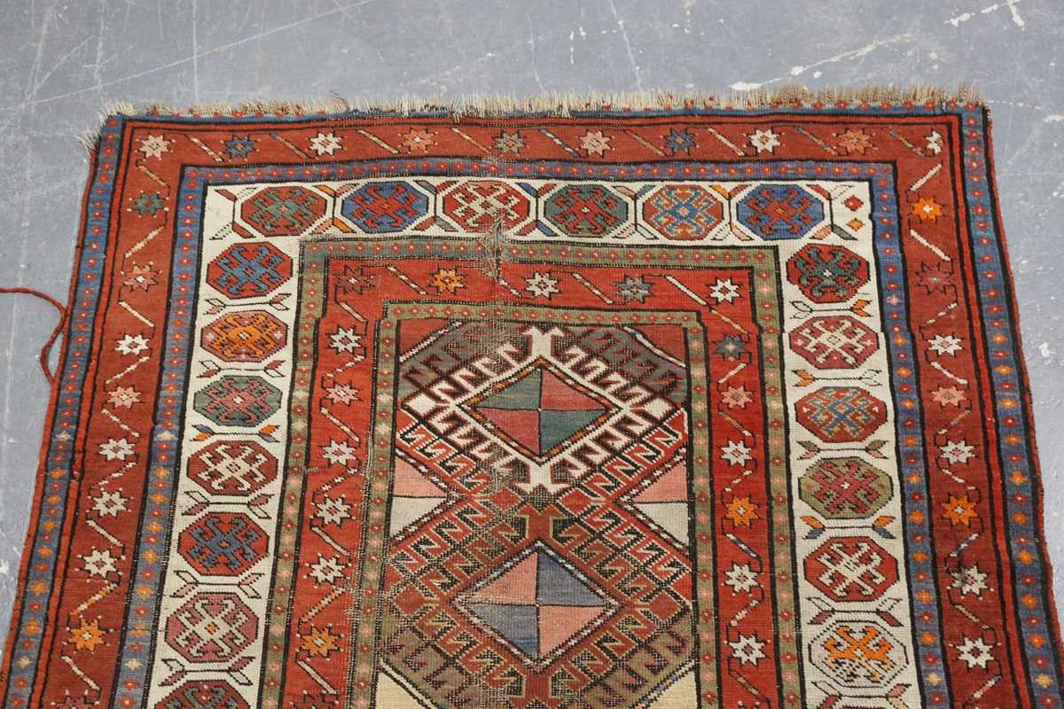 A Kazak runner, Caucasus, early 20th century, the polychrome field with a column of hooked - Image 2 of 6