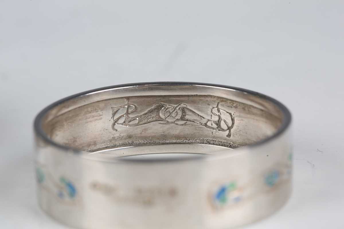 A pair of Liberty & Co 'Cymric' silver and enamelled napkin rings, Birmingham 1902, diameter 4. - Image 8 of 18