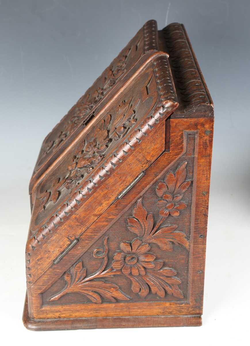 A late Victorian oak slope-front stationery box, carved with leaves and flowers, height 37cm, - Image 10 of 16