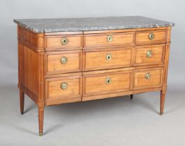 A late 18th century French Louis XVI period fruitwood five-drawer commode with a dark grey marble