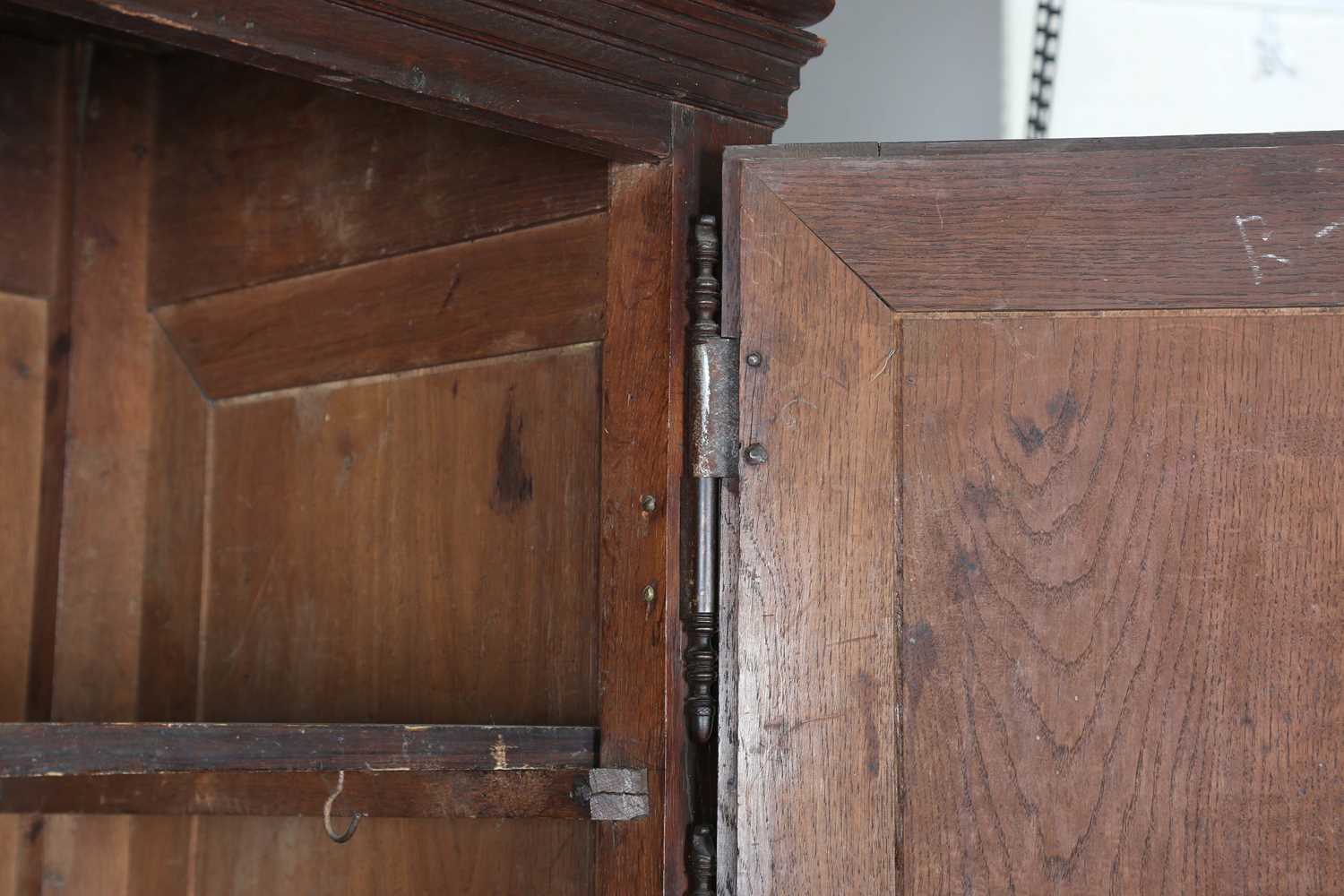 A large 18th century Continental oak cupboard, fitted with four panelled doors and two drawers, - Image 4 of 17
